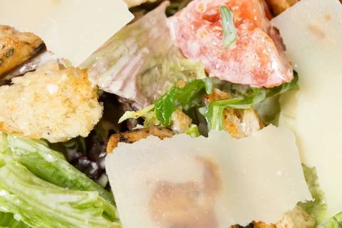 Caesar salad with grilled chicken. Stock Photos