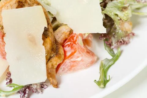 Caesar salad with grilled chicken. Stock Photos