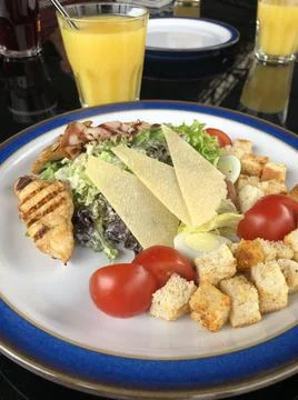 Caesar salad with grilled chicken Stock Photos