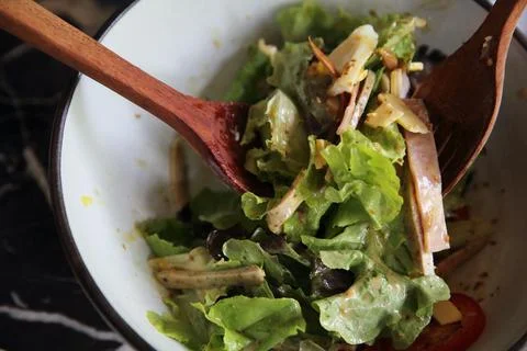 Caesar salad with ham and eggs Stock Photos