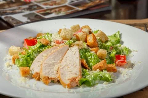 Caesar salad in the interior Stock Photos