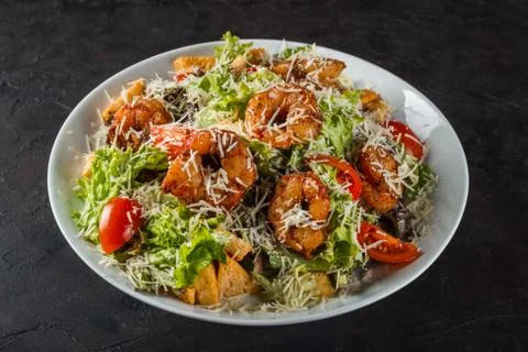 Caesar Salad with King Prawns, Cherry Tomatoes and Cheese Parmesan Stock Photos