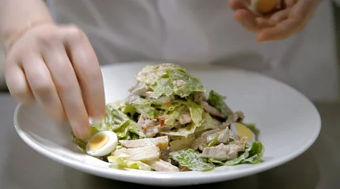 Caesar salad on a plate Stock Footage 58064670
