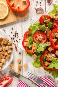 Caesar salad on rustic background Stock Photos