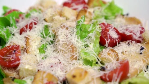 Caesar salad with tomato and parmesan cheese Stock Footage 108489400