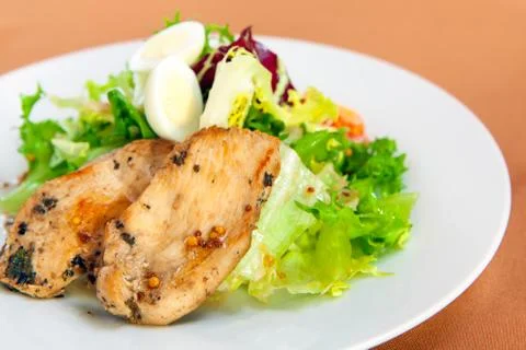 Caesar salad in white plate Foto stock