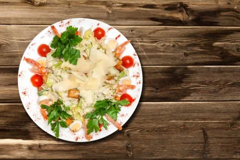 Caesar salad on a wooden table Stock Photos