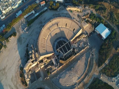 The Caesarea amphitheater shot from the air Stock Footage