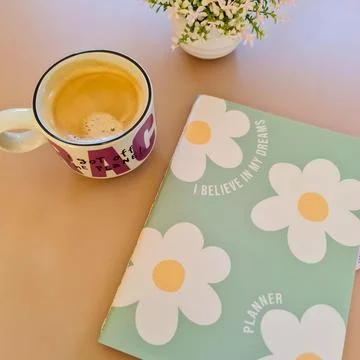 Caf and Flower Planner Stock Photos