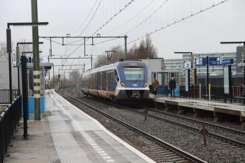 CAF civity SNG sprinter along platform of station Nieuwerkerk aan den IJssel  Stock Photos