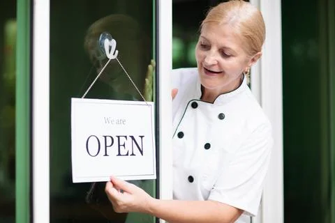 Caf opening on first day. Open door sign. Stock-Fotos
