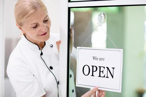 Caf opening on first day. Open door sign. Stock-Fotos