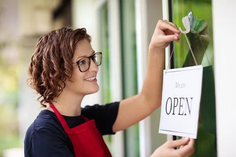Caf opening on first day. Open door sign. Stock-Fotos