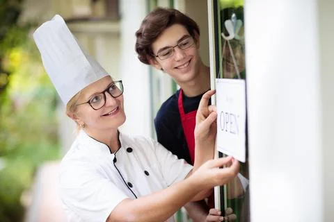 Caf opening on first day. Open door sign. Stock Photos