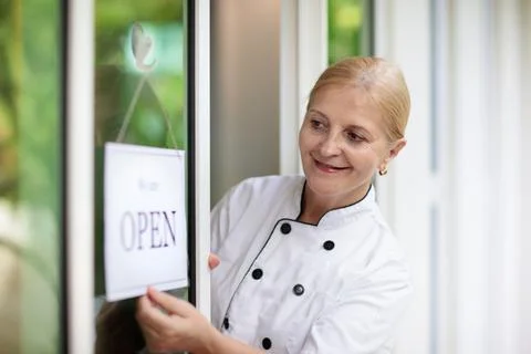 Caf opening on first day. Open door sign. Stock Photos