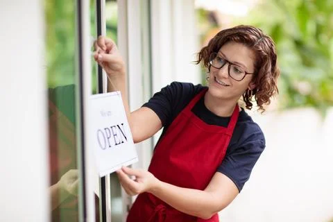 Caf opening on first day. Open door sign. Stock Photos
