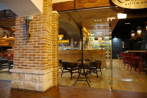 Cafe and shops inside gallery of old bastion in Ivano-Frankivsk, Ukraine Foto stock