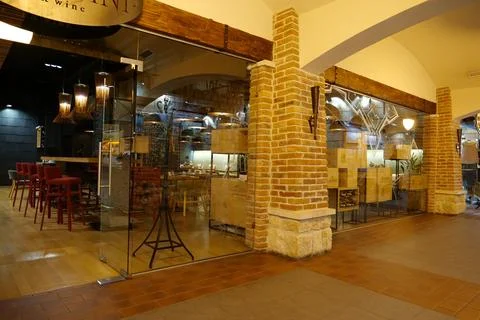 Cafe and shops inside gallery of old bastion in Ivano-Frankivsk, Ukraine Stockfoto's