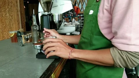The cafe barista is making an espresso Stock Footage 225424122