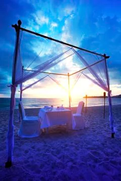 Cafe on the beach at sunset time Foto stock