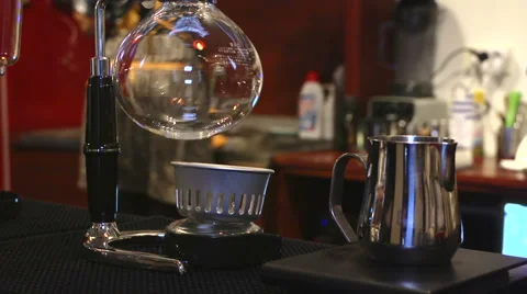 Cafe. Coffee brewing 1. Siphon and Vacuum Pot Coffee Brewers Video stock 58013032