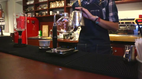 Cafe. Coffee brewing 3. Pouring water into a  bulb. Stock-Footage 58013027