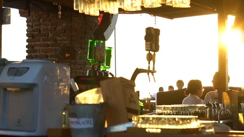 Cafe del mar serving drinks in the bar at sunset in Cartagena, Colombia Stock Footage 102487629