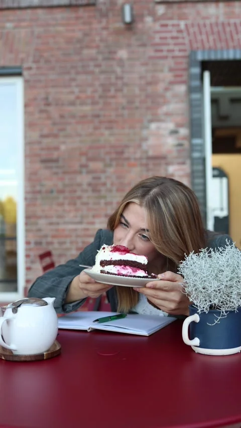Cafe inspector closely examines cake during professional quality review Stock Footage 344447509