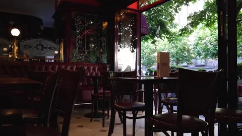 Cafe interior with large open doors time-lapse Stock Footage 79435307