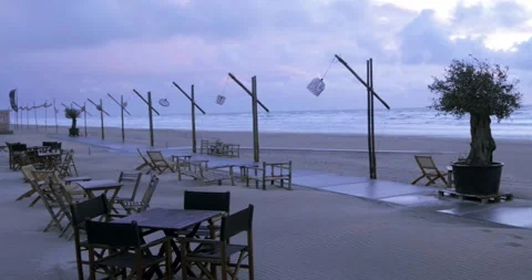 Cafe with lanterns on the beach Stock Footage 247648581