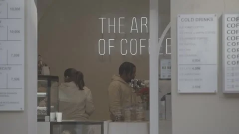 A café in Madrid, Spain, with customers and staff Stock Footage 345028178