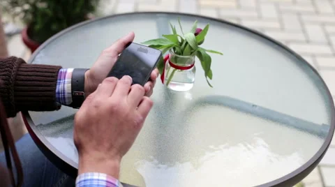 In the Cafe Man Pays for Using Phone and Terminal Stock Footage 65018814