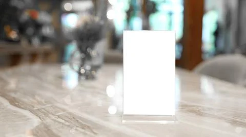 Cafe menu. Menu frame standing on wood table in Bar restaurant cafe. space... Stock-Fotos