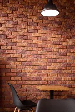 Cafe or restaurant empty table with chair loft lamp red brick wall, space for Stock Photos