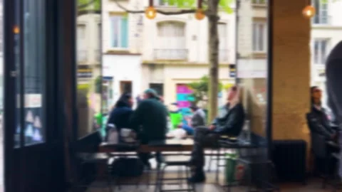 Cafe patrons sit by the open window. Paris, France. Out of focus. Stock Footage 319432660
