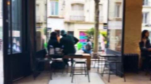 Cafe patrons sit by the open window. Paris, France. Out of focus. 스톡 동영상 319432783