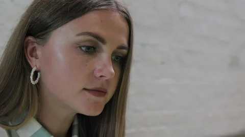 A cafe provides the setting for a young Ukrainian female freelancer to complete Stock Footage 245787162