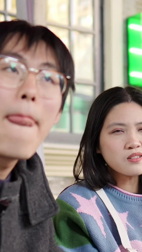 A cafe on a public road where many people walk in Shanghai, China. A young Stock Footage 301707229