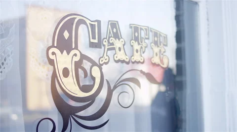Cafe sign painted on a window Video stock 51897407