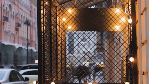 Cafe veranda in light bulbs. cage for two lovers. decoration 스톡 동영상 120133919