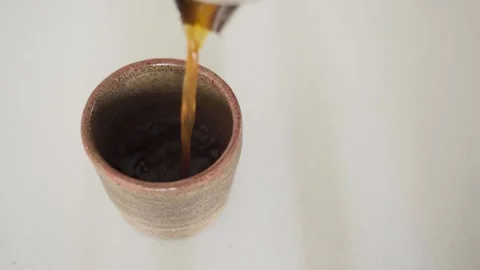 CafeCrafted Elegance: Pouring Coffee into Handmade Porcelain Cup Видео 263509569