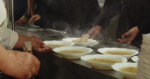 Cafeteria Worker Serving Hot Soup to Students in School Canteen Vídeo Stock 328939512