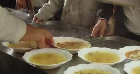 Cafeteria Worker Serving Hot Soup to Students in School Canteen Vídeo Stock 328939518