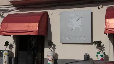 Caffe al ciclope sicily italy cafe front entrance with sign logo Stock Footage 252152799