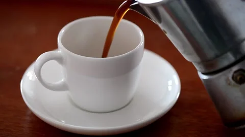Caffè break with a cup of black coffee made with Italian moka, moca Stock Footage 233009906