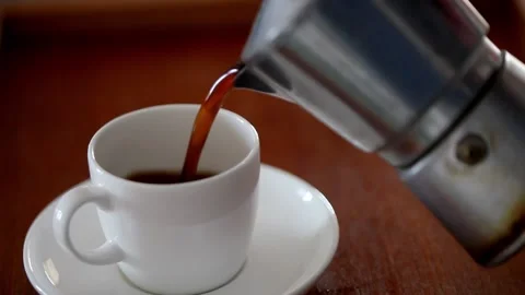 Caffè break with a cup of black coffee made with Italian moca, moka Stock Footage 233009911