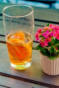 Caffeinated cold drink with mate extract, orange slices and ice cubes Stock Photos