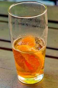 Caffeinated cold drink with mate extract, orange slices and ice cubes Stock Photos