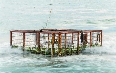 Cage in the sea Stock Photos