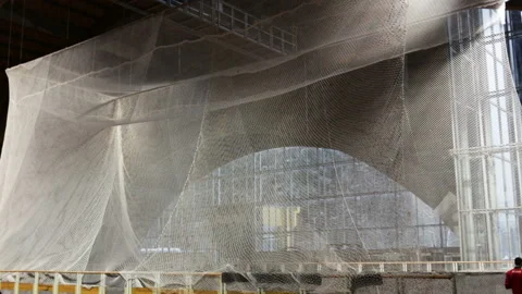 The cage for throwing the discus. Camera movement from bottom to top, master pla Stock Footage 85536337